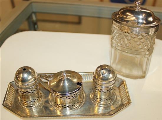 Silver cruet set on stand and continental bottle(-)